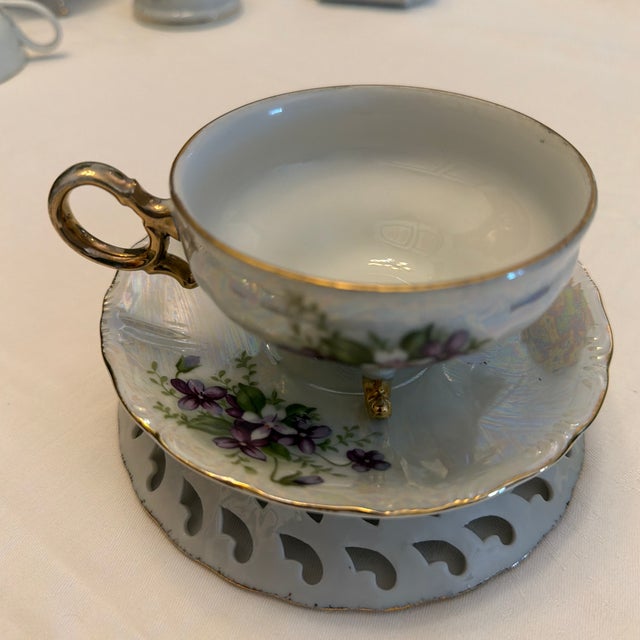 White Vintage Iridescent Porcelain Teacup and Saucer With Violets and Gold Trim. For Sale - Image 8 of 12