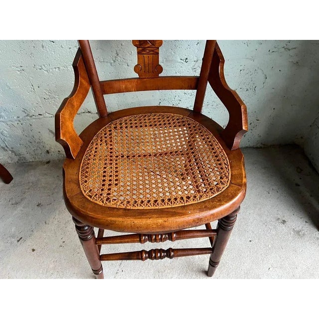 Early 20th Century Pair of Antique Eastlake Walnut Cane Seat Armchairs For Sale - Image 9 of 11