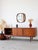 Add a touch of authentic elegance to your home with this magnificent 1960s teak sideboard. Crafted by the renowned British...