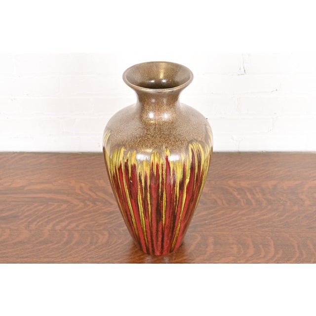 A gorgeous Modern drip glazed large urn form ceramic art pottery vase In the manner of Rookwood Pottery Circa Late 20th...