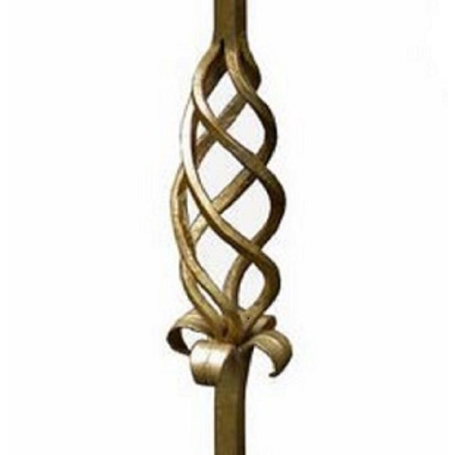 An Art Deco period wrought iron candle stand holder from France circa 1920. Wrought iron with scrolled and braided details...