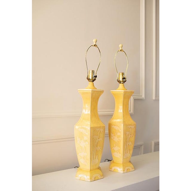 A beautiful pair of Mid-Century yellow ginger jar lamps attributed to Paul Hanson, crafted in ceramic with a vibrant...