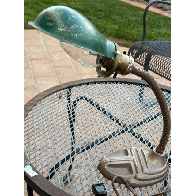 Antique Iron Desk Crook Neck Desk Lamp with Green Metal Shade. This lamp has a nice, heavy iron bottom that dates this...