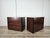 A pair of Italian-made storage units from the 1970s, crafted from rosewood veneer and featuring a rigorous, geometric...