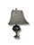 This table lamp from the 1990s features a refined neoclassical design, modeled after classical urn forms. The lamp is...
