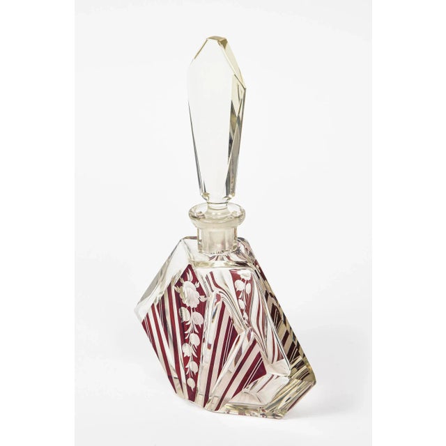 Geometric Art Deco Bohemian perfume bottle from theCzech Republic dating to the 1930's. The stylized triangular shape of...