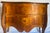 Beautiful, marquetry bombe commode chest reminiscent of the 19th Century French and Louis XVI style. 2 drawer chest with...