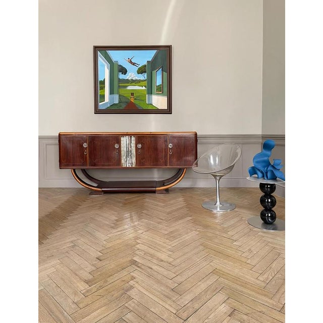 Late art deco with early Italian modernist influence.