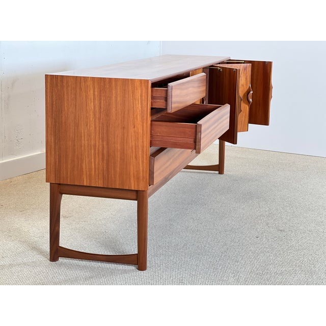 This sideboard is a unusual model very rare to come across in the market. Tom robertson the head of design of a.h....