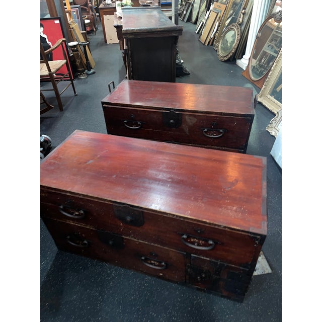 Japanese Tansu wardrobe Isho-Dansu from the Taisho period with metal handles. This wooden tansu is a fine example of...