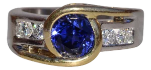 The Crieff: Ladies 14K Two Tone Ring set with Tanzanite and Diamonds