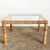 Wonderful vintage bohemian glass top coffee table. Features a rattan rapping throughout the frame and legs of the table.