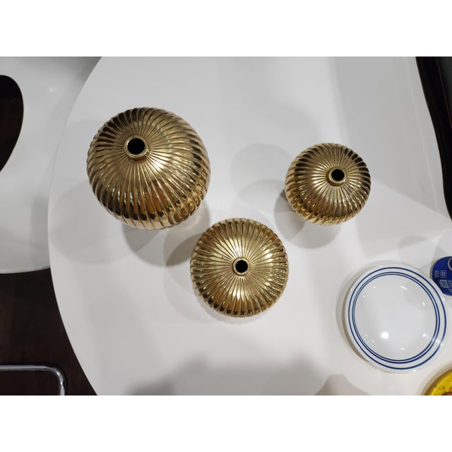 Set of 3 decorative 1958 French brass bottles by Kinder-Harris Stuttgart.