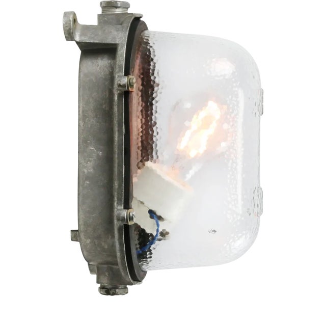 Industrial Cast Metal & Frosted Glass Sconce For Sale