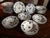 An elegant forty-four (44) piece blue and white porcelain plates set with Floral and Insect decoration, a magnificent...