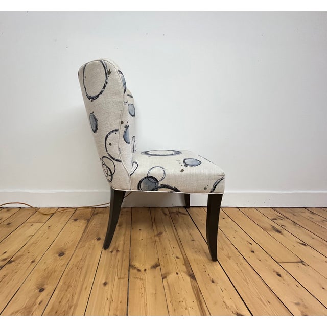 Pair of Kravet Oxford dining chairs featuring a tailored modern silhouette upholstered in a striking abstract patterned...