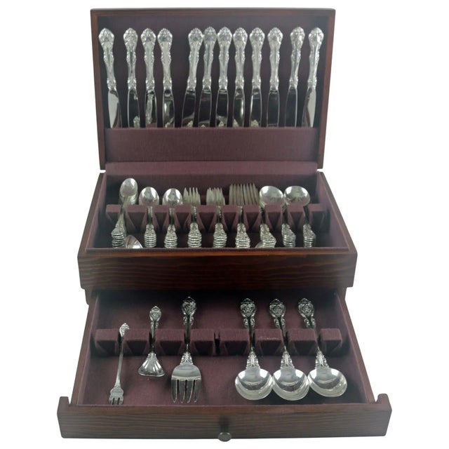 Large sterling silver flatware service in King Edward pattern by Gorham. Service for 12 with serving pieces, housed in a...