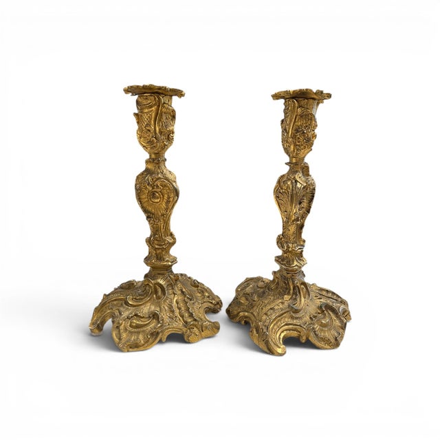 This elegant pair of 19th-century French bronze candle holders is inspired by the graceful curves and decorative...