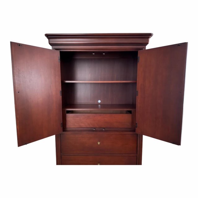 Elegant armoire from the highly sought-after Thomasville Impressions Martinique Collection, crafted in richly finished...