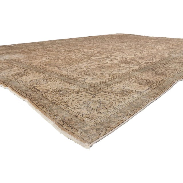 78583 Distressed Vintage Persian Tabriz Rug, 11'02 x 15'06. ​Warm bucolic charm meets rustic sensibility in this...
