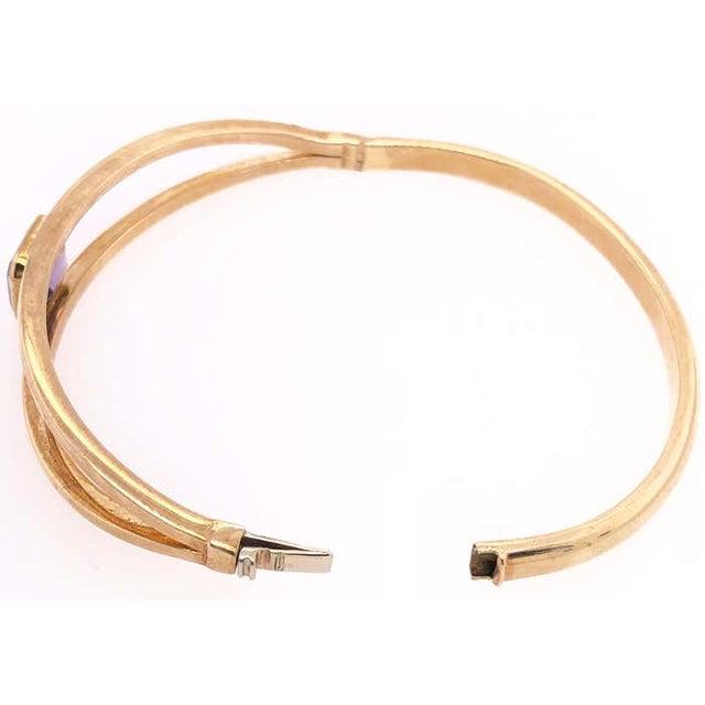 14 Karat Yellow Gold 7.8 Fancy Link Bangle with Square Amethyst Solitaire 10 grams total weight.