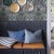 A stylized depiction of a Swedish meadow in bloom, Boråstapeter’s Blomstervall wallpaper is a surface-printed design that...