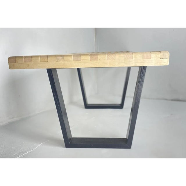 This platform bench strikes with the crisp attack of mid-century modernism, each slat precisely spaced to create a...