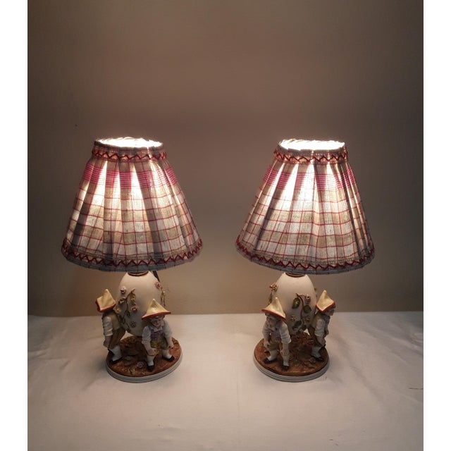 Tiny small tops on the blossoms of the figures, orginal head switch made of bakelite, fully functional This piece has an...