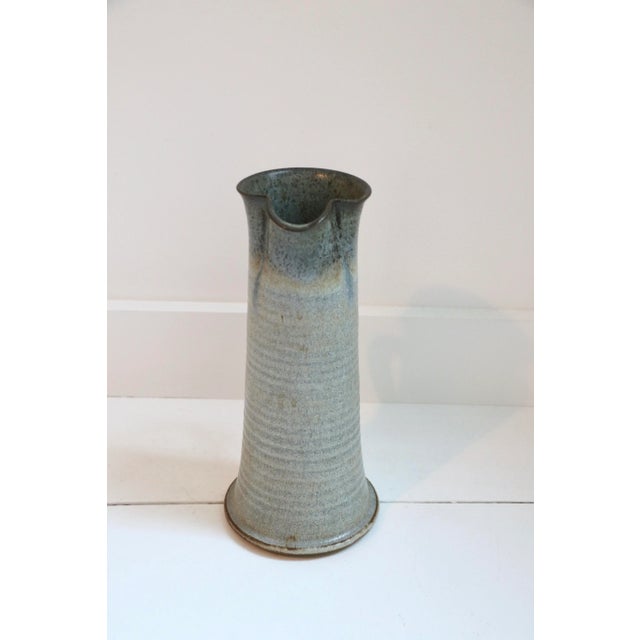 Beautiful hand thrown earthenware pitcher, glazed interior and water tight.