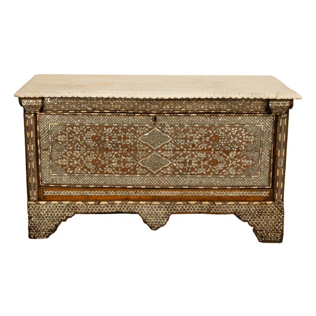 This very beautiful antique chest has a serpentine shaped white marble top, with a carved edge of acanthus leaves. The...