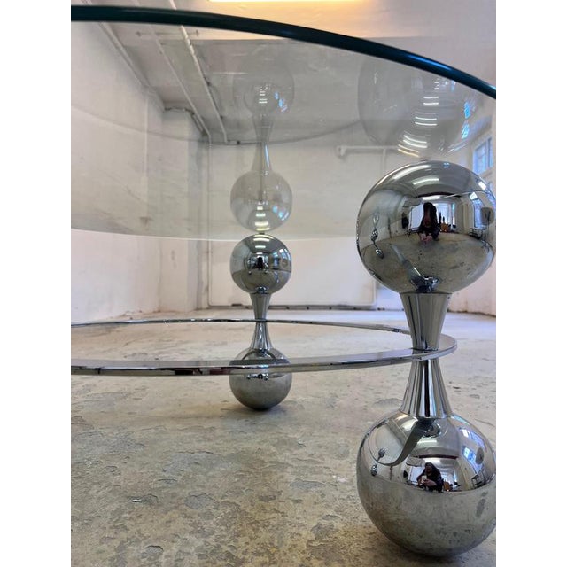 This coffee table is a spectacular statement piece of Space Age design, perfectly capturing the futuristic spirit of the...