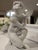 Bring classical elegance to your tabletop with this exquisite antique porcelain bisque sculpture of the Crouching Venus...