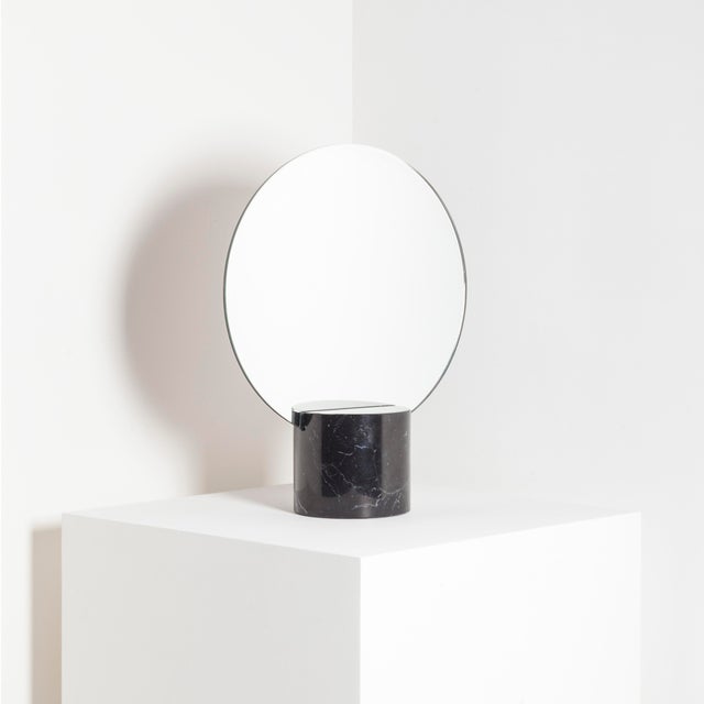 The Sun Mirror is a sculptural wall mirror that combines the timeless elegance of marble with the warm radiance of solid...