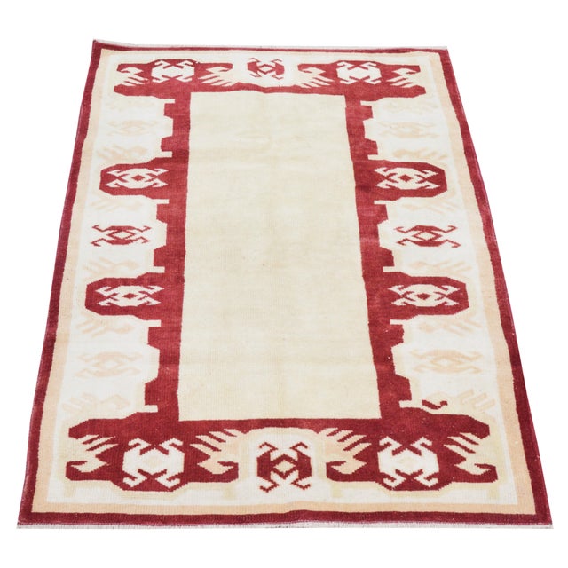Hand-knotted with care using traditional rug-making techniques, this wool rug blends timeless craftsmanship with a modern...