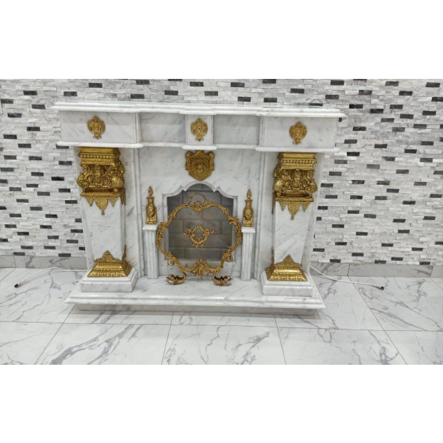 Description: Add grandeur and timeless style to your space with this exceptional Neoclassical-style fireplace mantel,...