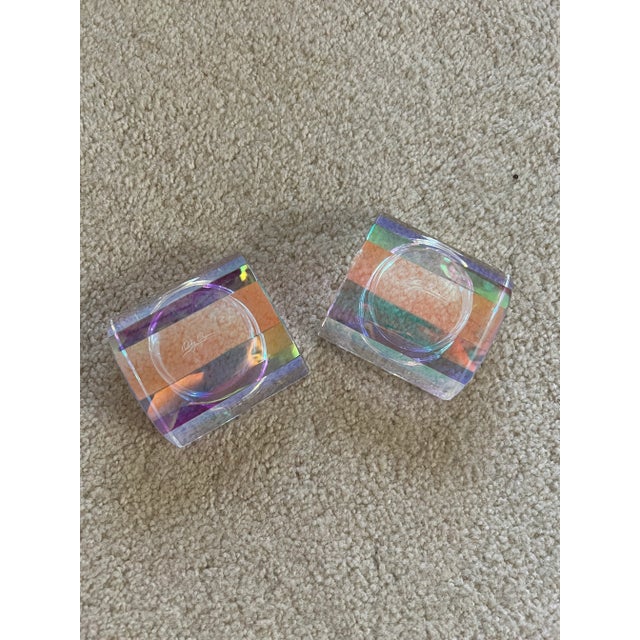 This is a vintage signed Oleg Cassini Crystal votive candle holder. Beautiful prism which ever angle you hold it. Elegant...