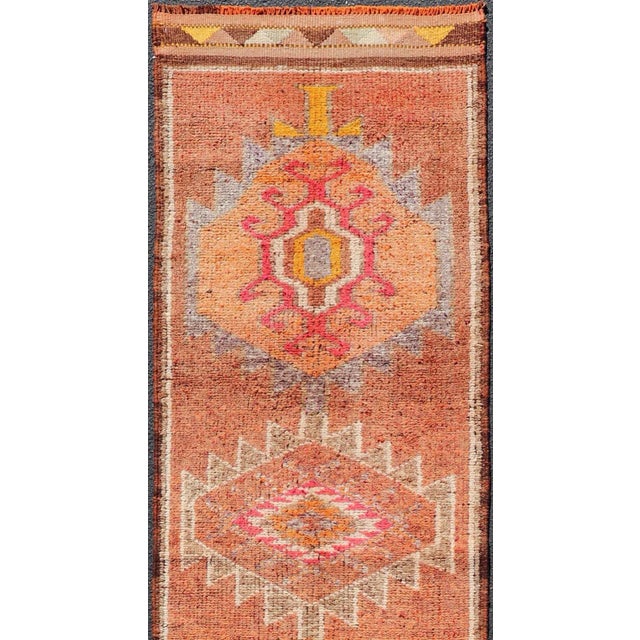 Measures: 2'9 x 11'0 Vintage Turkish Runner with Large Medallion Kurdish Design in Earthy Tones. Keivan Woven Arts / rug...