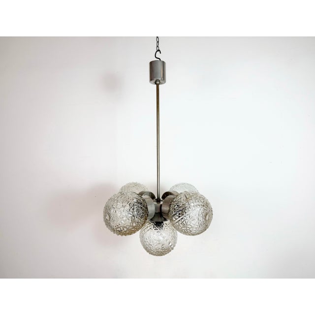 Vintage chandelier made by lustry n.p. Kamenický šenov in former czechoslovakia during the 1960s. The chandelier is made...