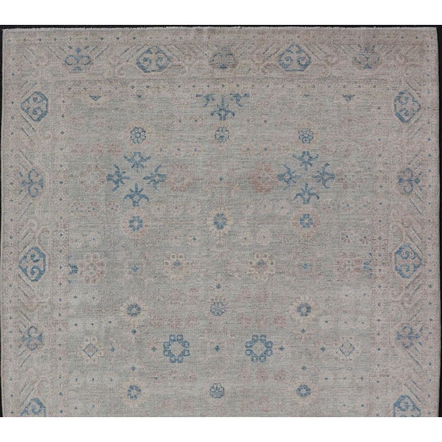 Measures: 4'2 x 6'2 Modern All-Over Floral Oushak with Muted Background and Accent Colors. Keivan Woven Arts: rug AWR-6825...