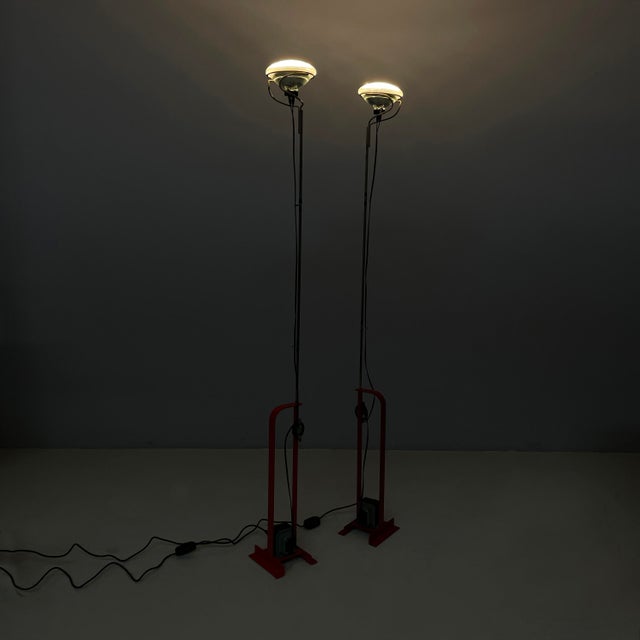 Italian modern floor lamps toio by achille pier giacomo castiglioni for flos, 1970s pair of floor lamps model toio with...