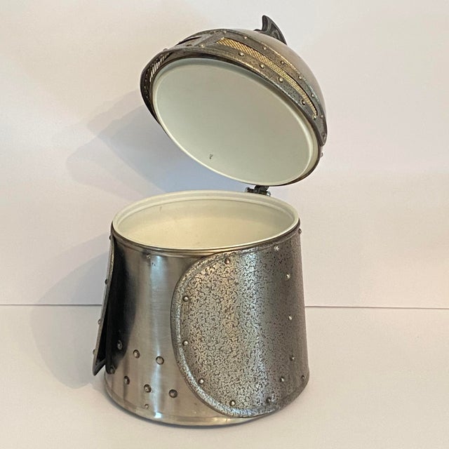 1970s medieval knight's helmet ice bucket manufactured in Japan for Seymour Mann Imports and Olde Tankardware. The...