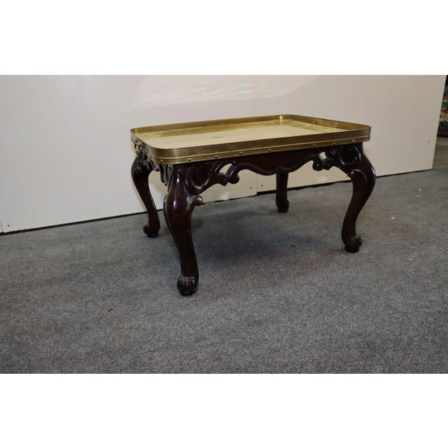 Regency Style Brass and Rosewood Coffee Table, brass top with handles, rosewood base with pierced scalloped skirt on...