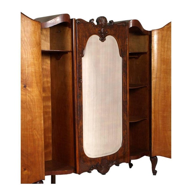 Important venetian artistic armoire in richly figured burled walnut, attributed to the atelier of vincenzo cadorin and...