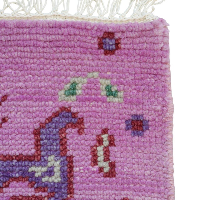 Hackney is a rug inspired by classic Oushaks in an updated color palette of lavender, cobalt blue, emerald green, and...