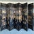 Monumental Chinese Lacquered 8-Panel Coromandel Screen Depicting Court Scenes Offered for sale is a monumental Chinese...