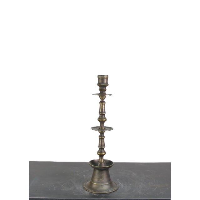 This vintage solid Turkish brass candle holder is a versatile piece that can be used as a candle holder or lamp base. It...