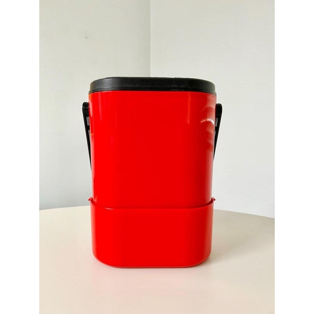 Iconic insulated wine carrier designed by Richard Carlson for Décor Australia. This bold red molded plastic cooler holds...