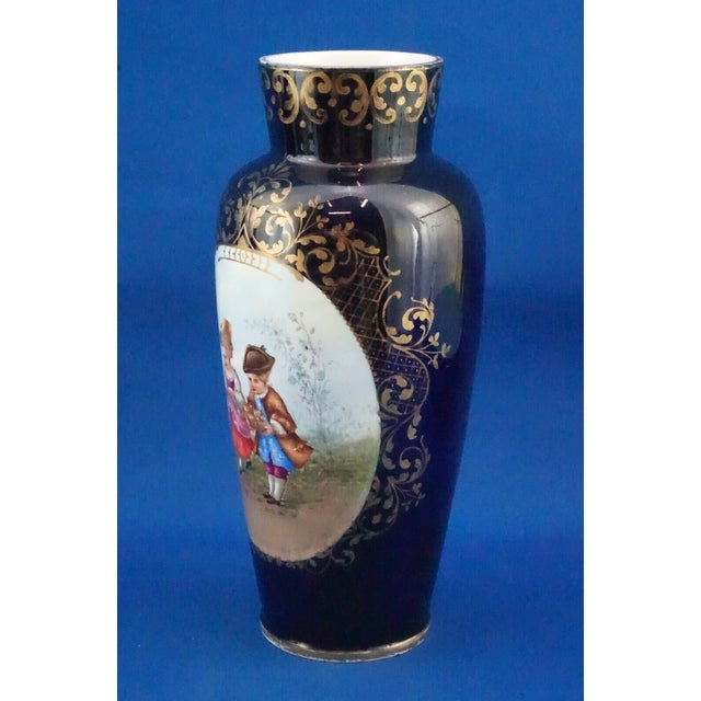 Item : A vitrified hard-paste porcelain vase with a central decoration depicting a pair of children, entirely hand-...