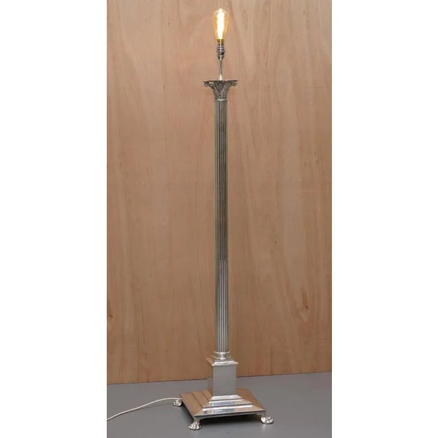 We are delighted to offer for sale this stunning vintage silver plated floor standing Corinthian pillared floor lamp with...