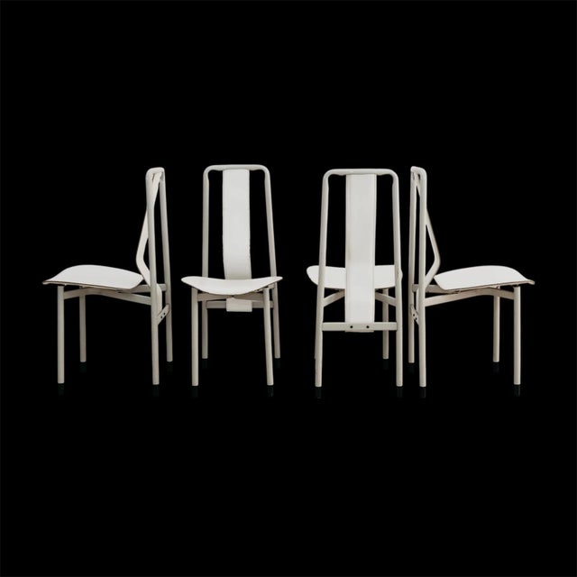 This exquisite set of four Irma chairs is a masterpiece of geometric simplicity and industrial rigor, designed in 1979 by...